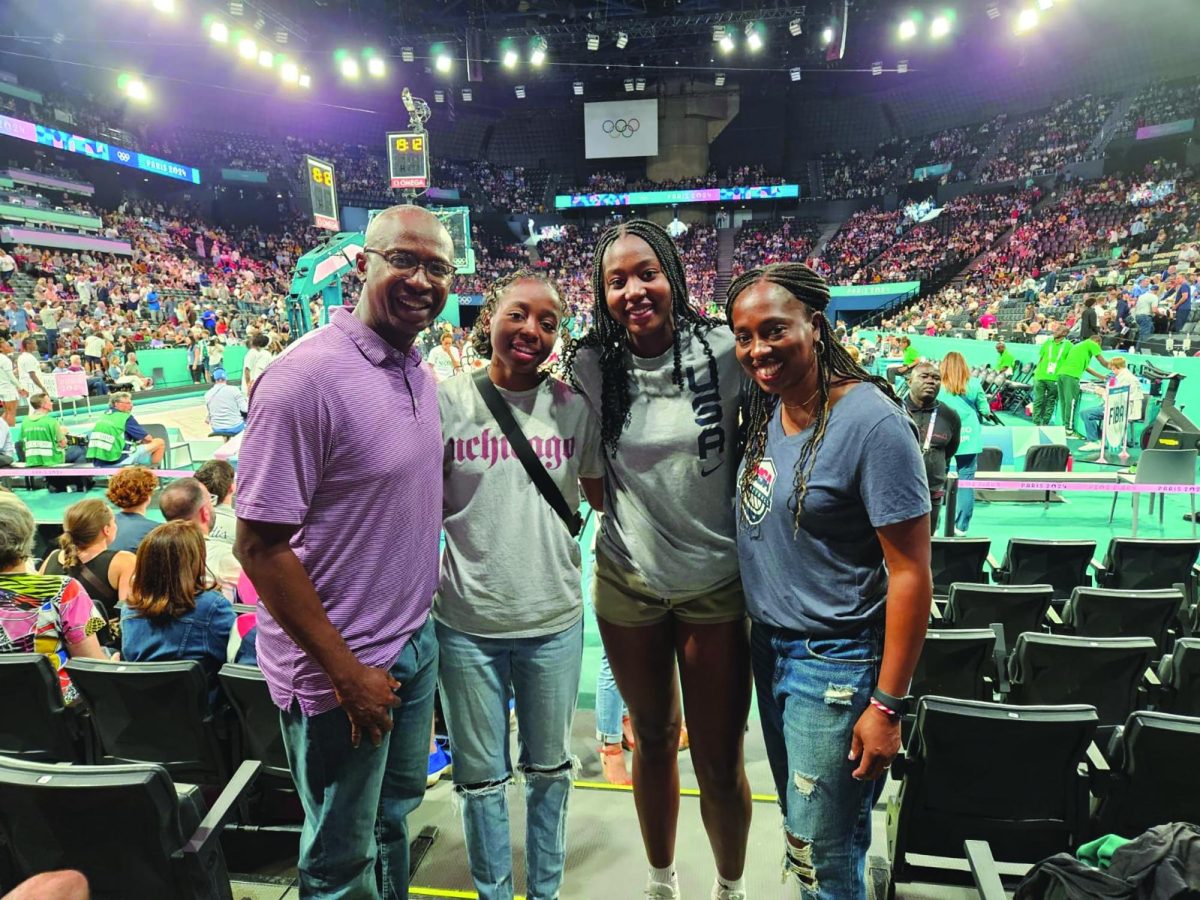 Nora Ezike ‘25 and family at women’s basketball game in Paris (photo courtesy of Ezike)