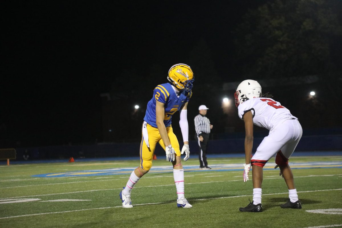 Wide reciever Travis Stamm '25 lines up during home game on Sept. 29 against Proviso West in the first half