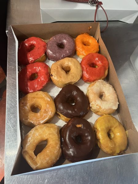 Variety dozen donut box includes variety of flavors, such as wildberry