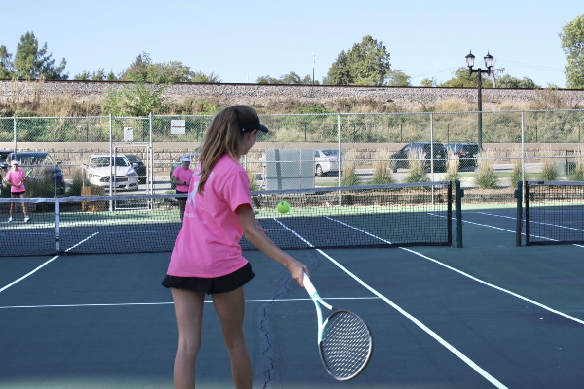 Erin Hanzlik '26 hits a ball in training drill at the varsity Pink Out practice on Oct. 2
(photo courtesy of Brooke Stacks). 