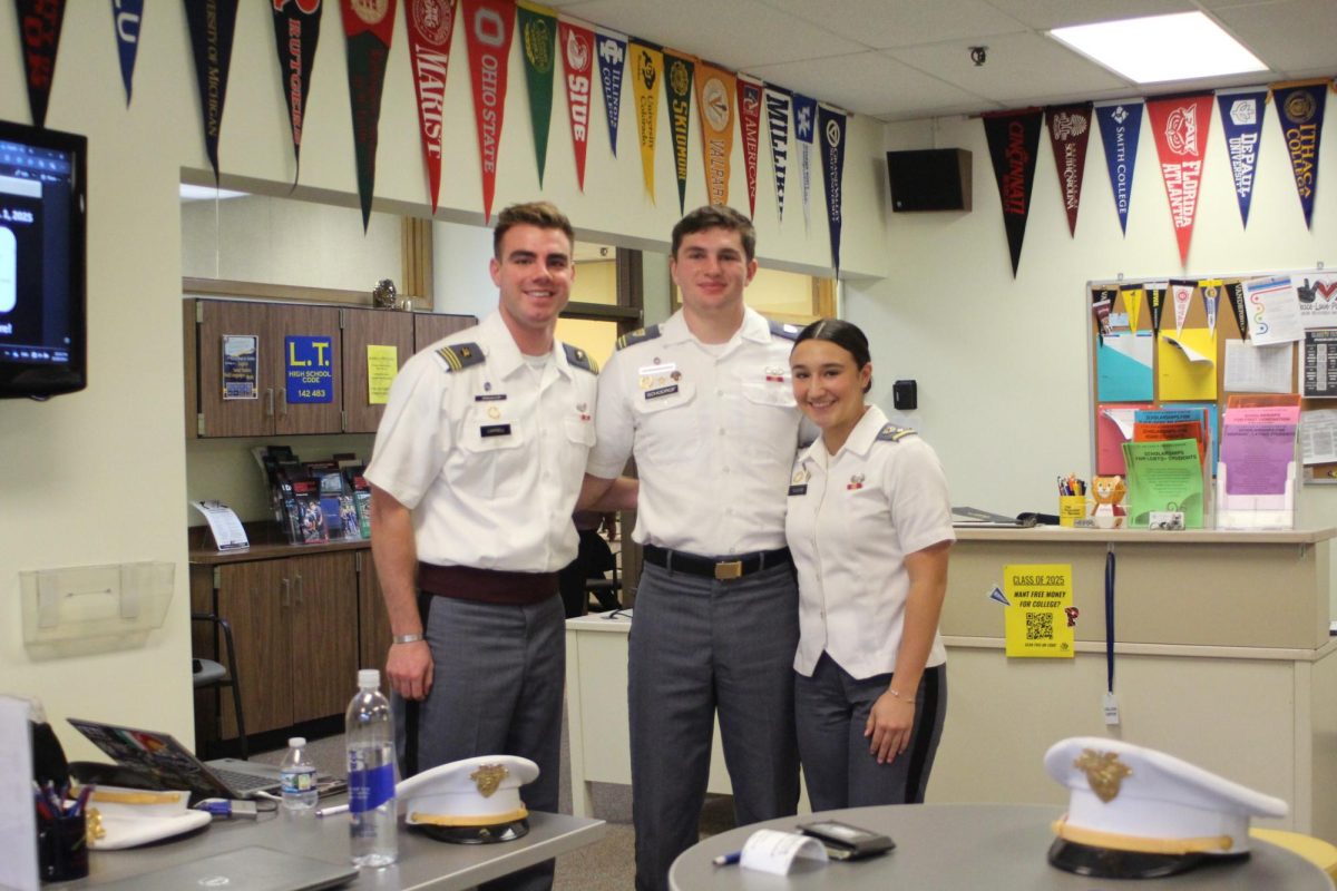  Cadet Kayla Teuscher and LT Alumni and Cadets Benjamin Campbell ‘21 and Cooper Schodrof ‘22 pose for picture on November 25 at NC room 148