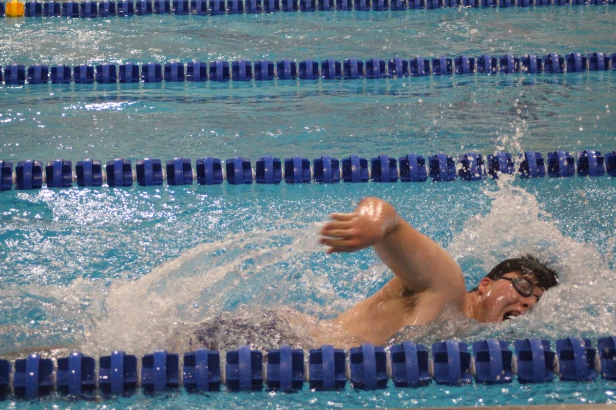 Will Stroka '26 competes in freestyle event against Oak Park River Forest on Jan. 17 at home (Brooks/LION)