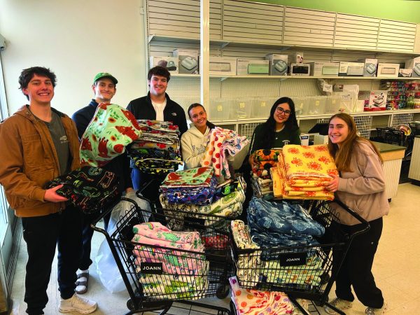 NHS board members at Joann Fabrics buying supplies for the Blanket Drive on Feb. 9. (photo courtesy of Brenik Griffin)