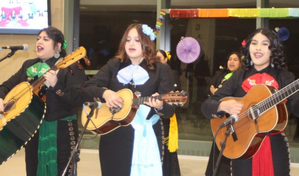 Mariachi Sirenas members perform at the multicultural festival in the NC cafeteria