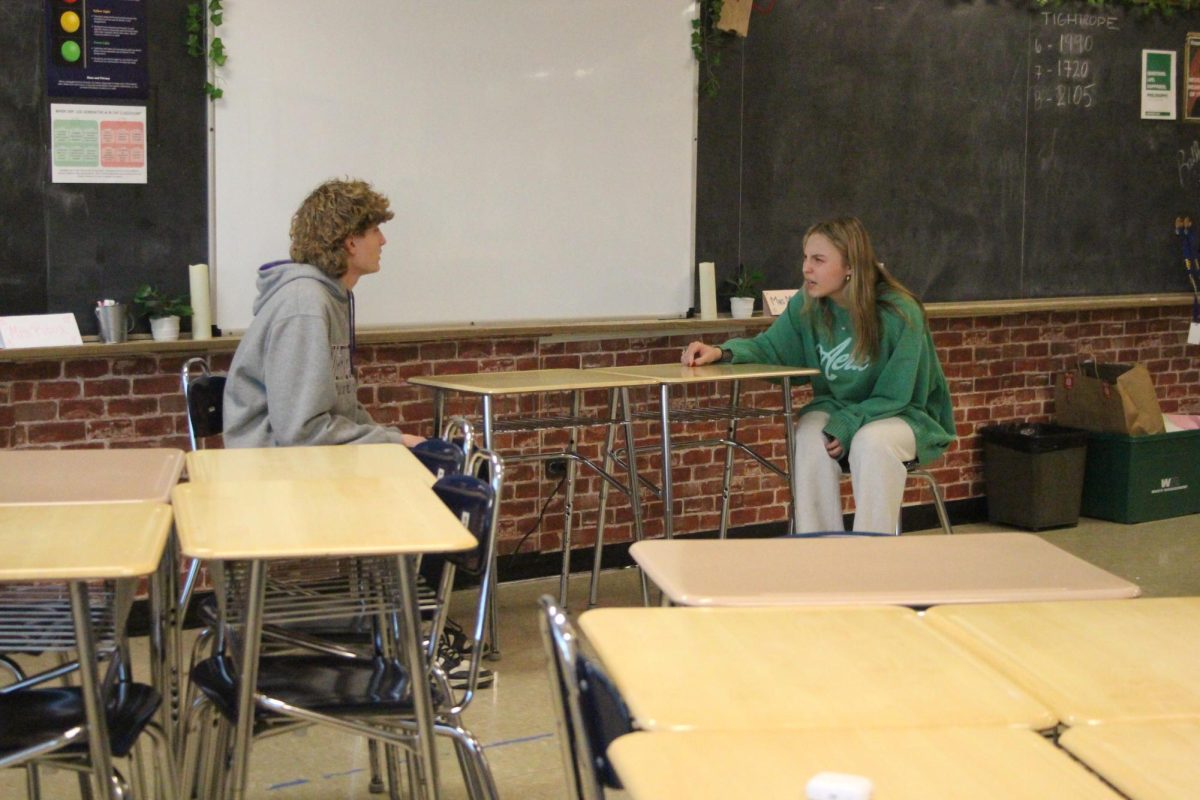 Sofia Magajne ‘25 and Cole Buckholter ‘26 rehearse their Interpretation speech at practice on Jan. 28.