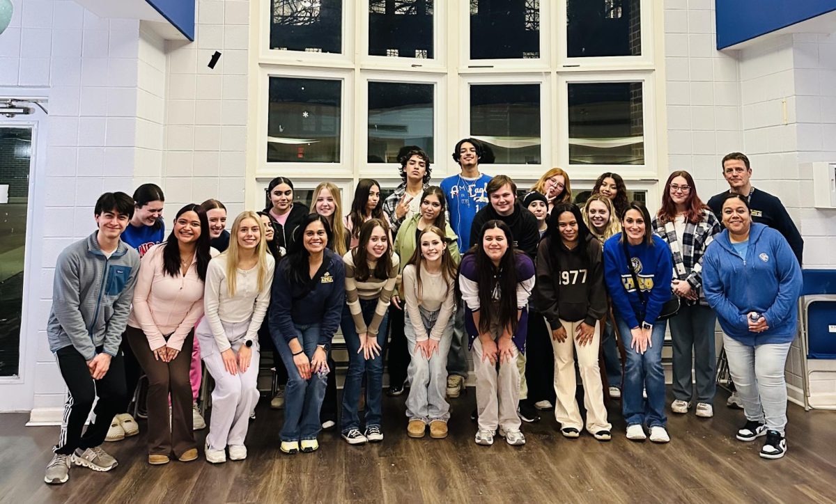 Forensics students gather together with their teachers at LYDIA home for a picture after spending time with the residents on March 3. The students created HopePaces to donate to the local organization (photo courtesy of Lerma). 